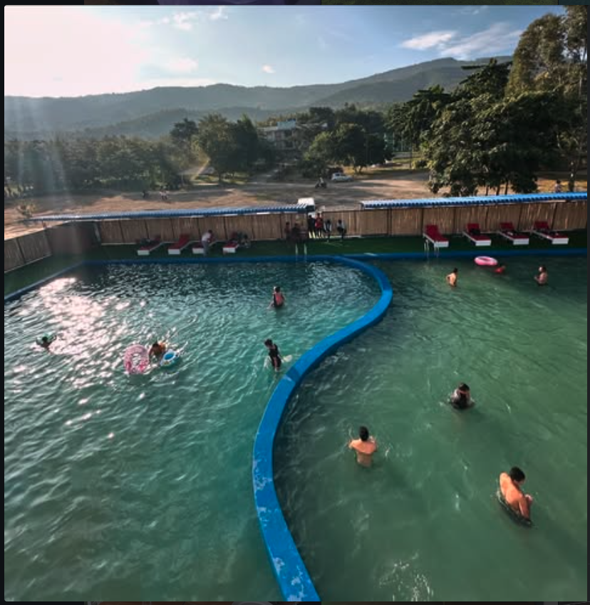 Pool daytime with mountains